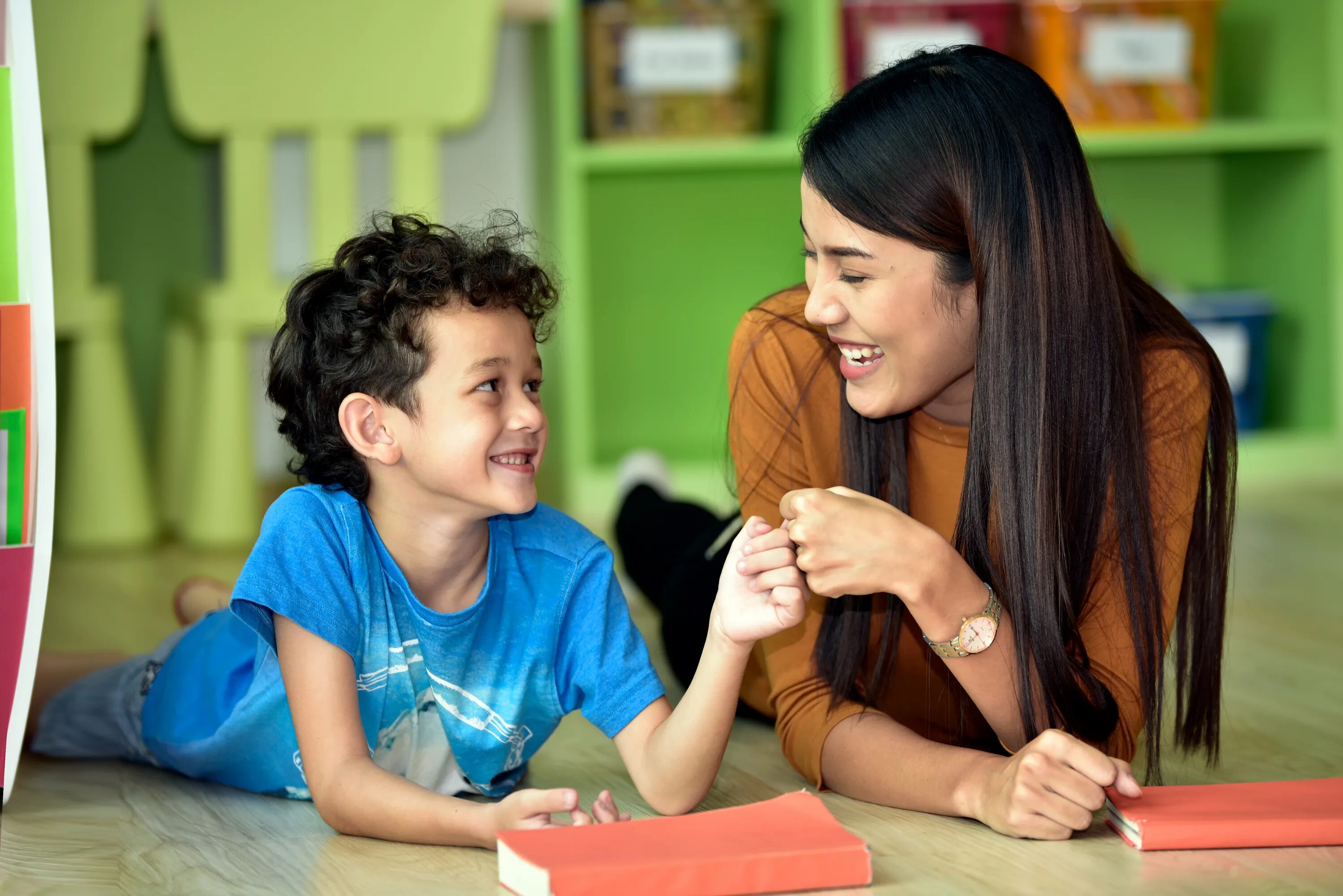 Kindergarten Kids and teacher. Child Care Education Institute. English teacher for Kids. They teach children