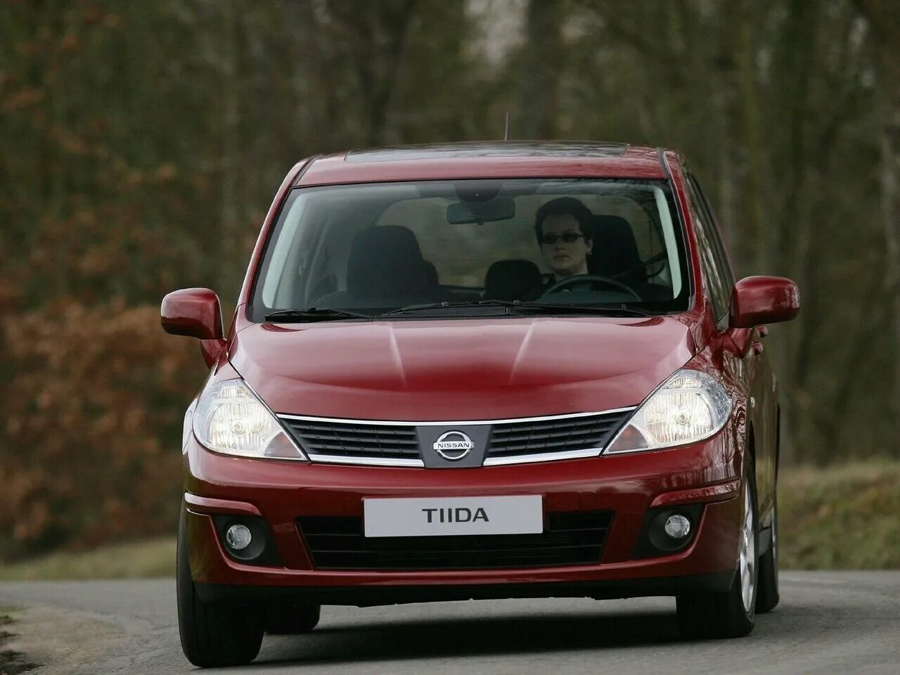 Машины похожие на ниссан. Nissan Tiida. Nissan Tiida c11. Nissan Tiida Nismo. Nissan Tiida 2007.