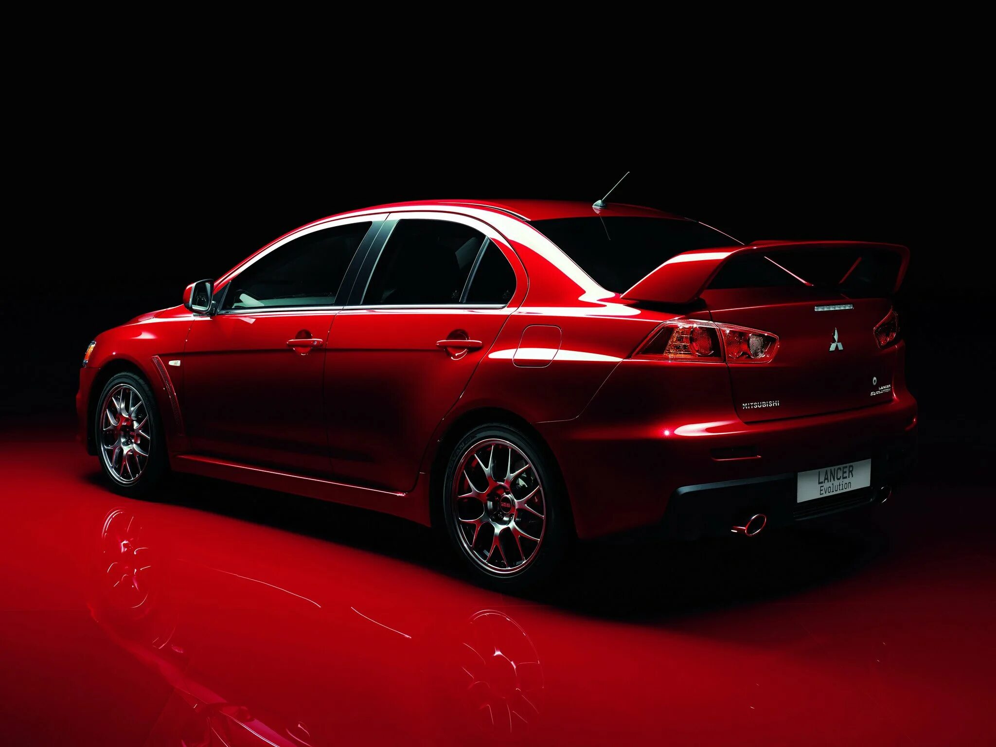 Lancer 10 2008. Митсубиси Лансер 10. Мицубиси Лансер Эволюшн. Mitsubishi Lancer Evolution 10 Red. Мицубиси Лансер 10 Эволюшн красный.