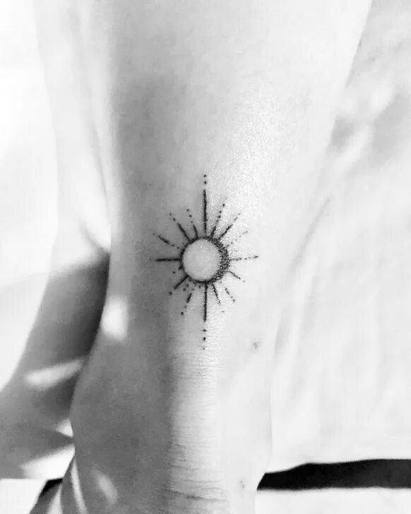 40 Sun Tattoo Ideas with Great Symbolic Meaning Foot tattoos, Sun tattoo designs