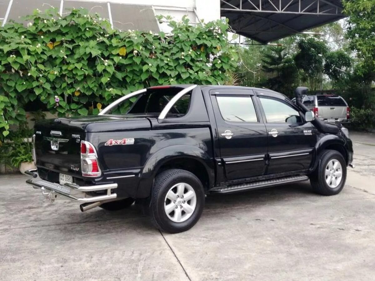 Пикап в краснодарском крае. Toyota Hilux 2010 кузов. Toyota Hilux 2012 с закрытым кузовом. Тойота Хайлюкс 2012 черный. Тойота Хеликс 2008.