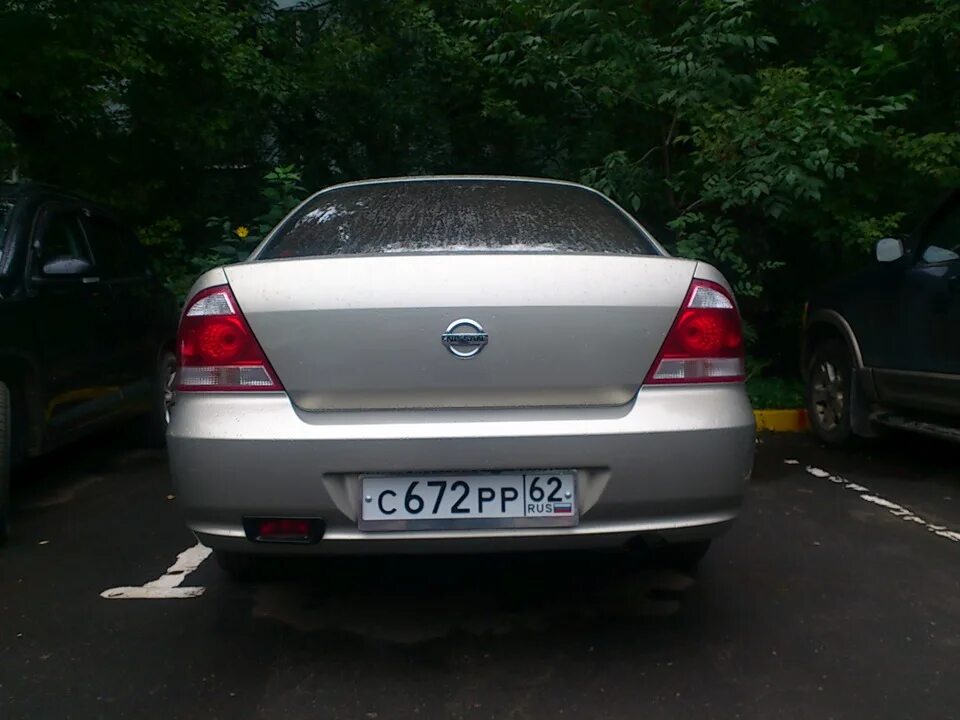 Демонтаж шильдиков сзади и перенос на переднюю решетку - Nissan Almera Classic (