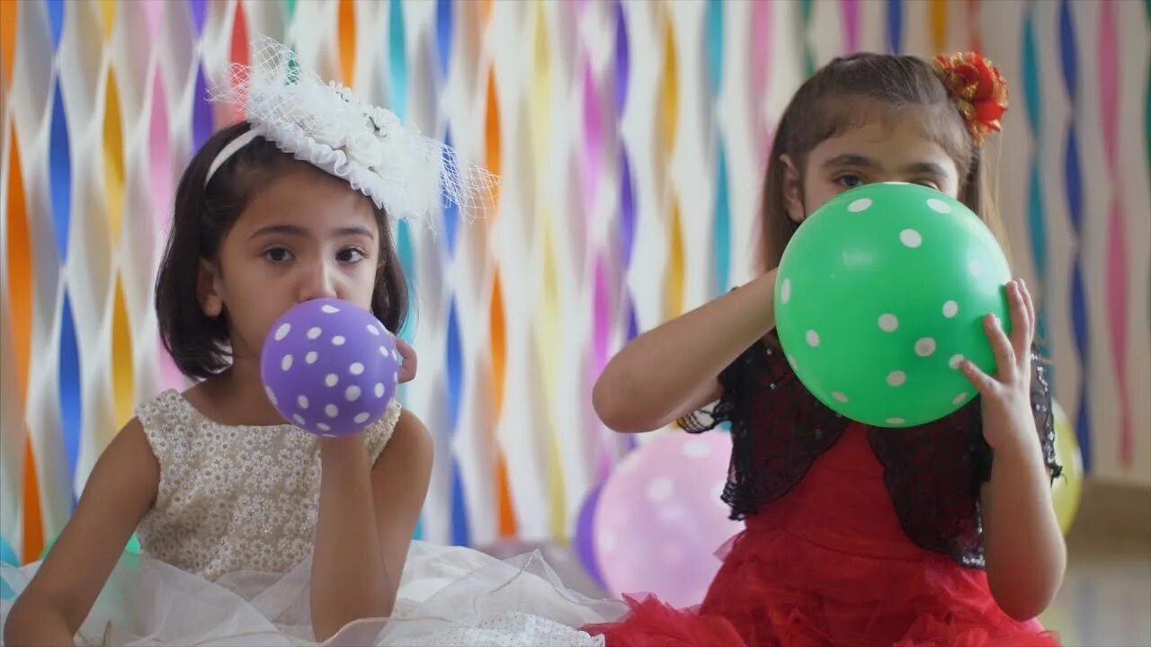 Balloon blowing up. Кид герл блоу. blowing balloons. blow a balloon. girl blowing up balloon.