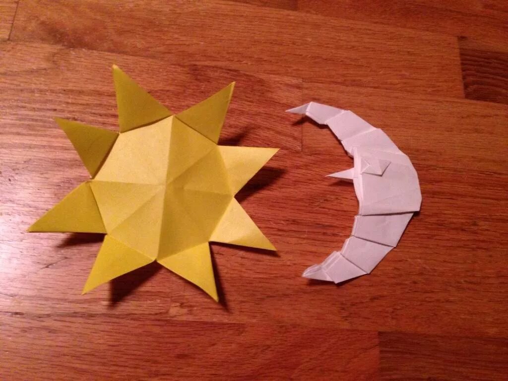 Оригами солнышко. Оригами солнце. Солнышко оригами из бумаги. Оригами солнце из бумаги.