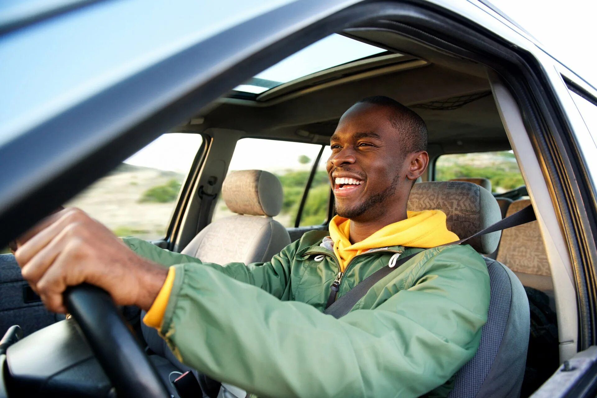 Водитель с кофе. Africa drive. A woman driving a car. Africa drive. Africa drive.