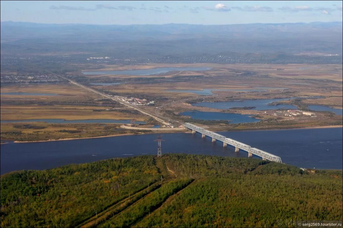 Сайт комсомольского района хабаровского края. Амурский мост Комсомольск-на-Амуре. Река Амур Комсомольск на Амуре. Комсомольск-на-Амуре Хабаровский край. Мост Комсомольск на Амуре.