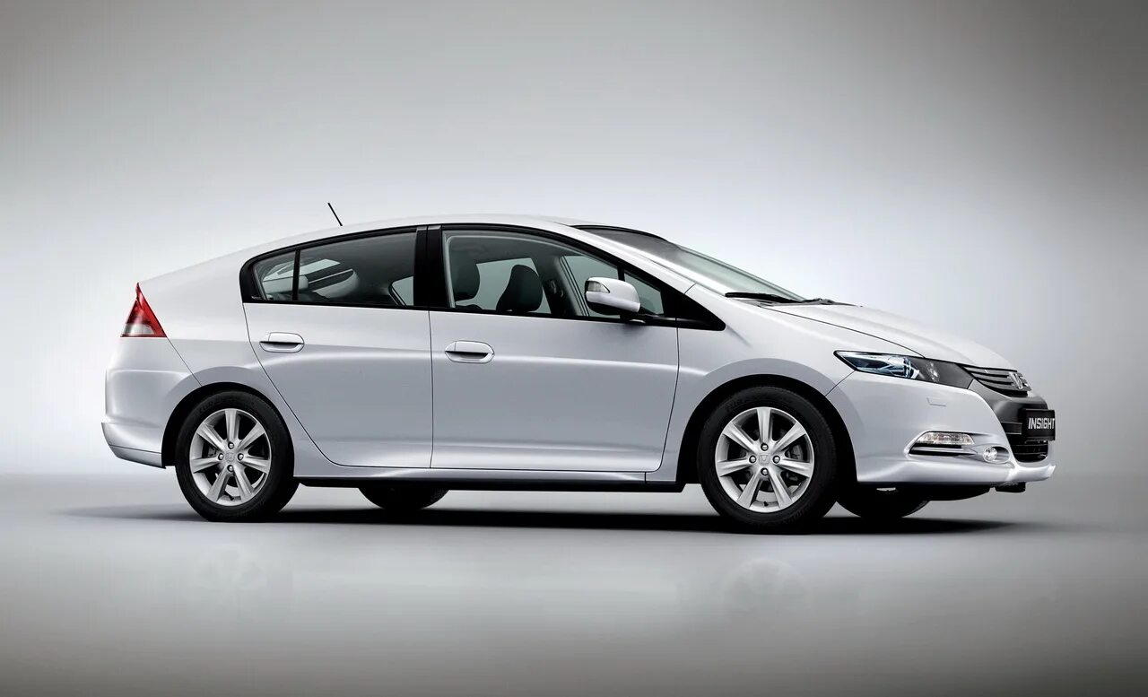 Honda Insight 2009. Honda Insight ze1. Honda Insight 2010. Хонда Инсайт гибрид 2009. Хонда гибрид автомобиля