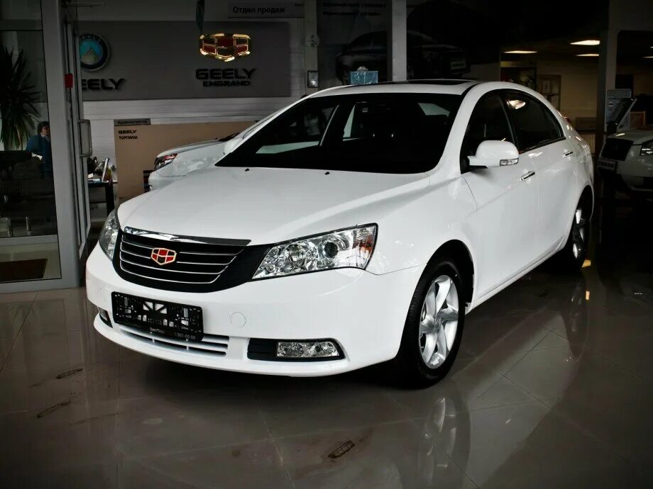 Джили эмгранд 2014 купить. Geely Emgrand EC 7 седан белый. Белый Geely Emgrand 7. Geely Emgrand ec7 2014. Geely Emgrand белая ec7 2009-2016.