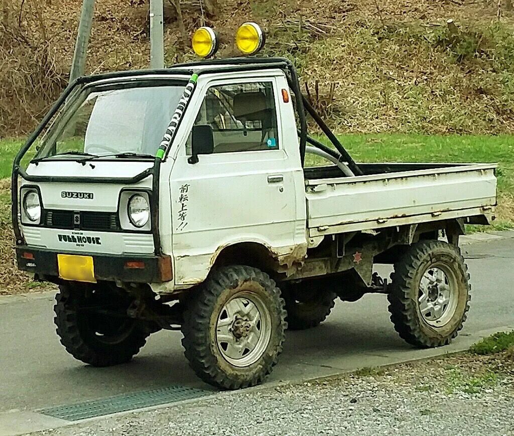 Мини полный привод. Suzuki carry 4x4. Suzuki carry 4x4 Mini Truck. Suzuki carry Truck 4wd. Suzuki carry 1990.