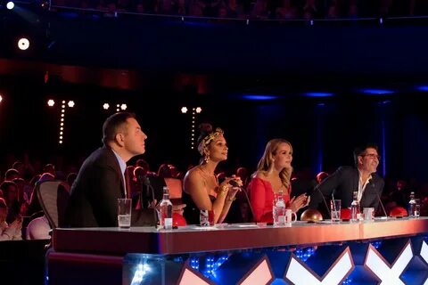 Britiain's Got Talent judges award first golden buzzer. 