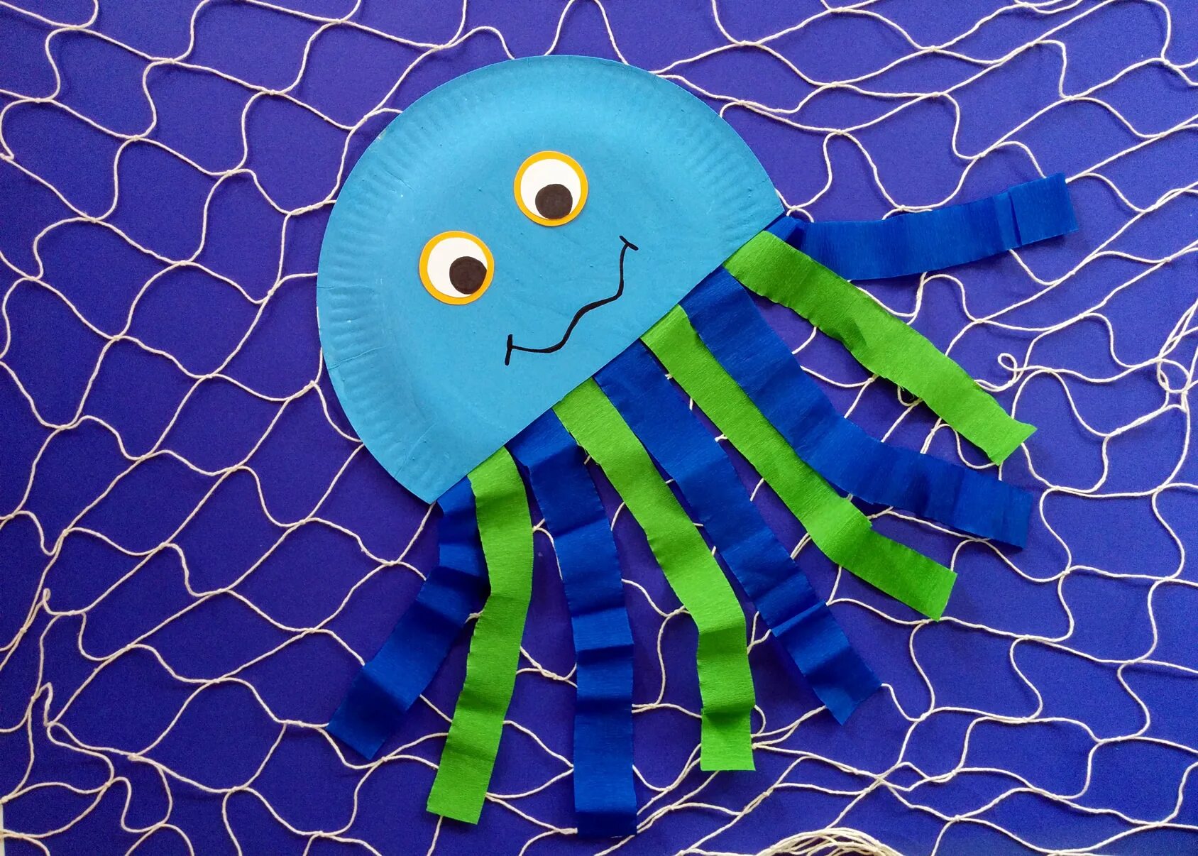 Осьминог объемный из бумаги. Как сделать осьминога из бумаги. Поделка осьминожка из бумаги. Поделка осьминог из бумаги. Осьминог поделка для детей из бумаги.