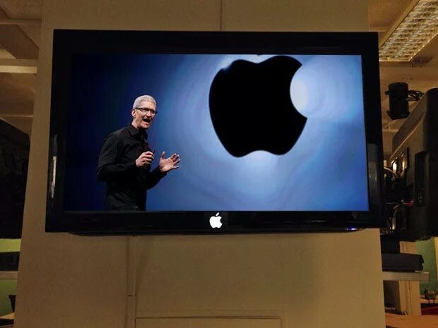 Демонстрация айфона на телевизор. Телевизор Эппл. Телевизор АПЛ. Телевизор Apple большой. Телевизор компании Apple.
