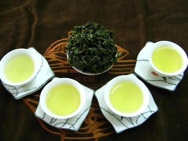 Китайский зеленый чай. Чай Tian Sheng молочный улун. Те Гуань Инь чай эффект. Чай Тегуаньинь зеленый. Японский чай тигуанинь.