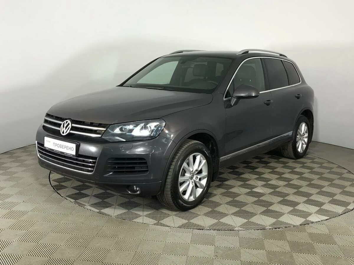 Купить фольксваген туарег 1 поколения. Volkswagen Touareg 2014 черный. Volkswagen Touareg 2 поколение. Фольксваген Touareg 2014. Touareg II 2012.