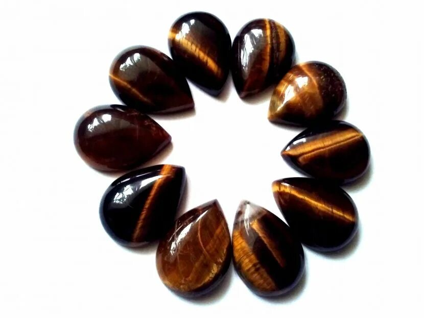 Тигриный глаз камень. Жёлтый глаз тигра камень. Ювелирные украшения с тигровым глазом. Тигровый глаз камень санлайт. Тигровый глаз алмаз.