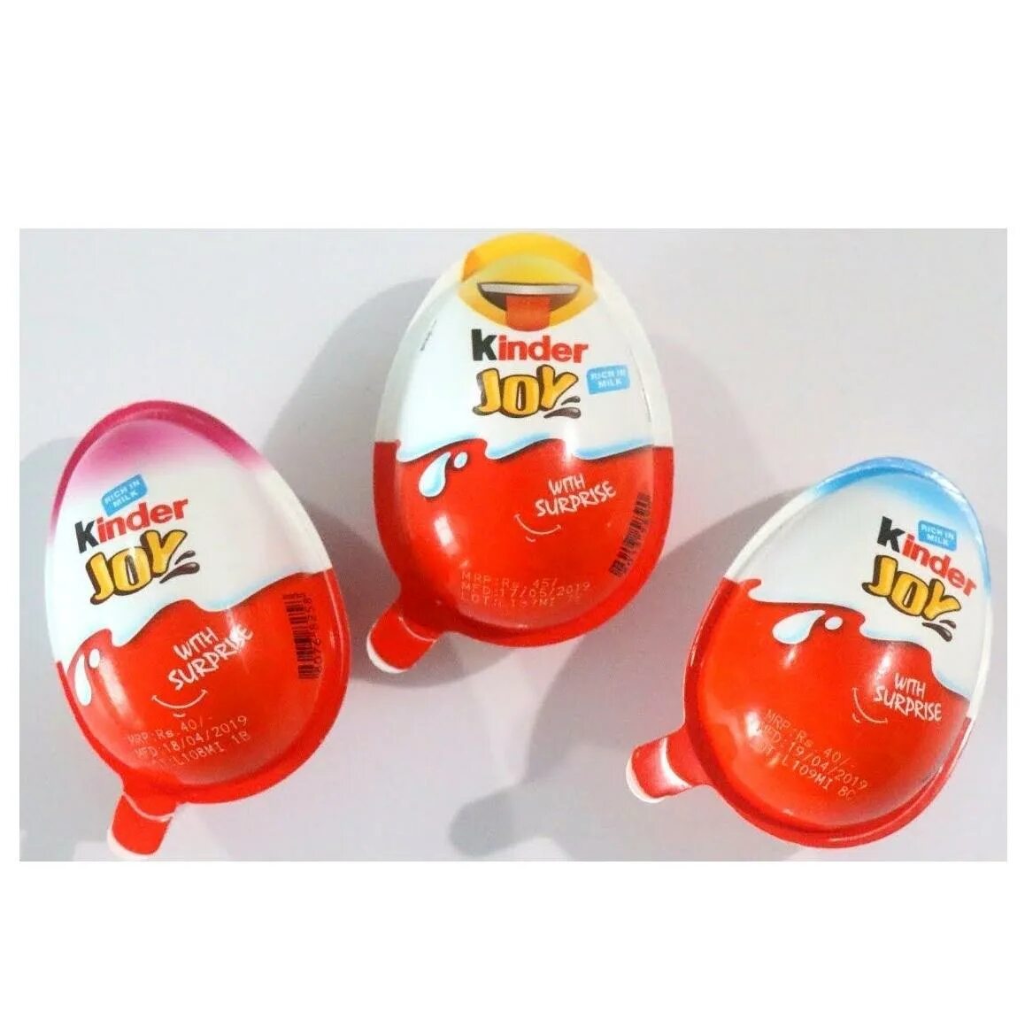 Киндер желтый. Киндер Джой Тойз. Kinder Joy яйцо. Kinder Joy игрушки. Шоколадное яйцо kinder Joy.