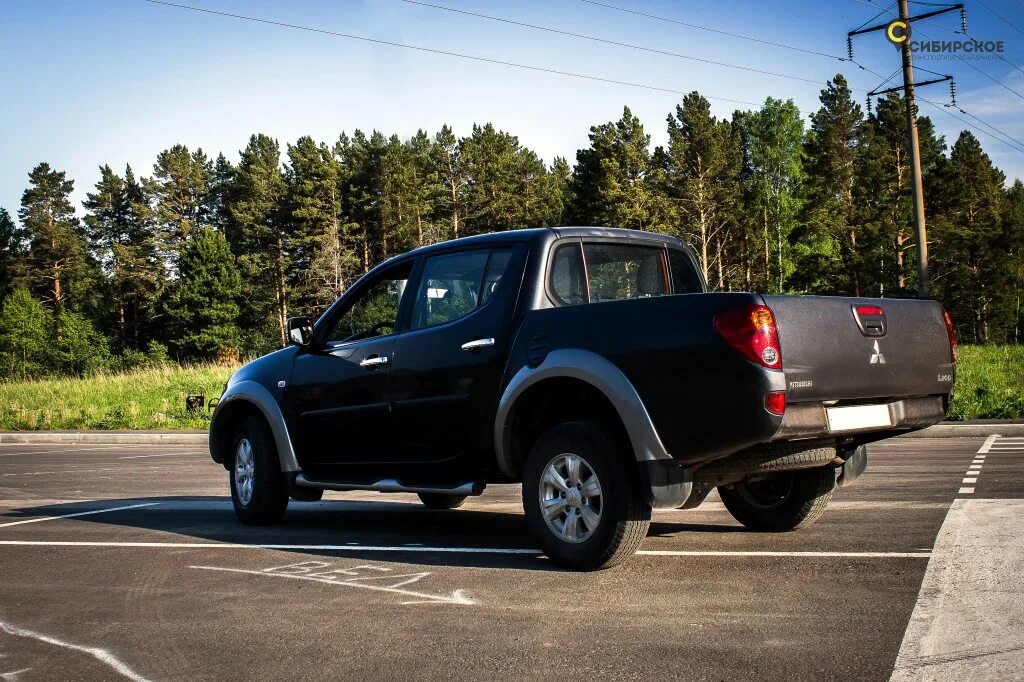 Митсубиси l200 2012. Мицубиси л200 2012. Автомобиль Mitsubishi l200, 2012.