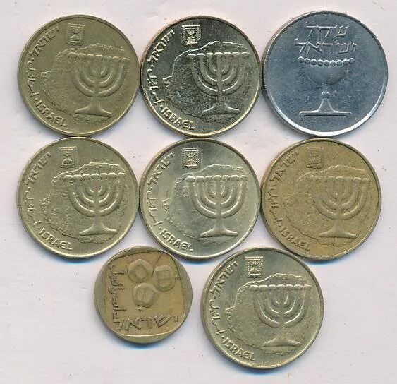 Монета израиля 4. Разменная монета в Израиле. Израильская монета с дырочкой. Пятишекелевые монеты Израиля по годам.