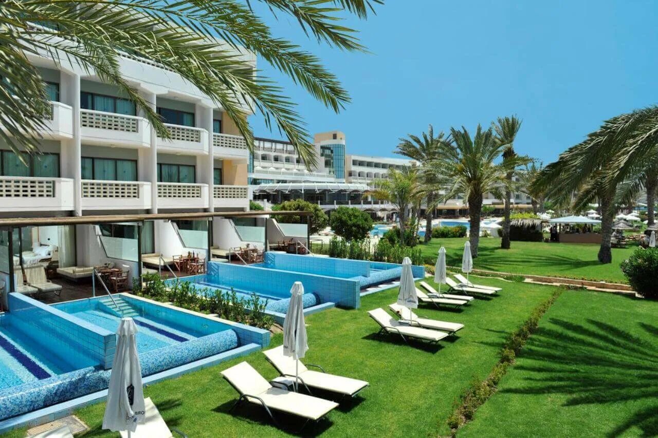 Отели кипра 4. Constantinou bros athena beach hotel 4. constantinou bros athena beach hotel пафос. отель кипр пафос 2 звезды. пафос кипр отели 4 звезды.