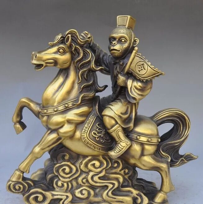 год лошади обезьяны. обезьяна на лошади фото. год лошади обезьяны. золотой бык статуэтка. год лошади обезьяны.