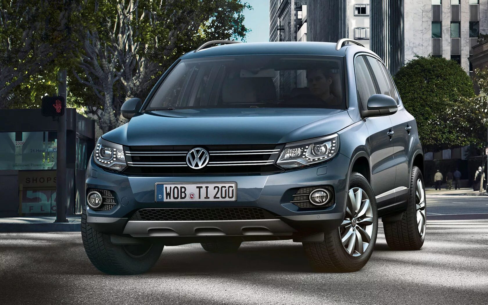 Машина volkswagen tiguan. Фольксваген Tiguan. Фольксваген Тигуан 2011. Tiguan 1. VW Tiguan 2011-2016.