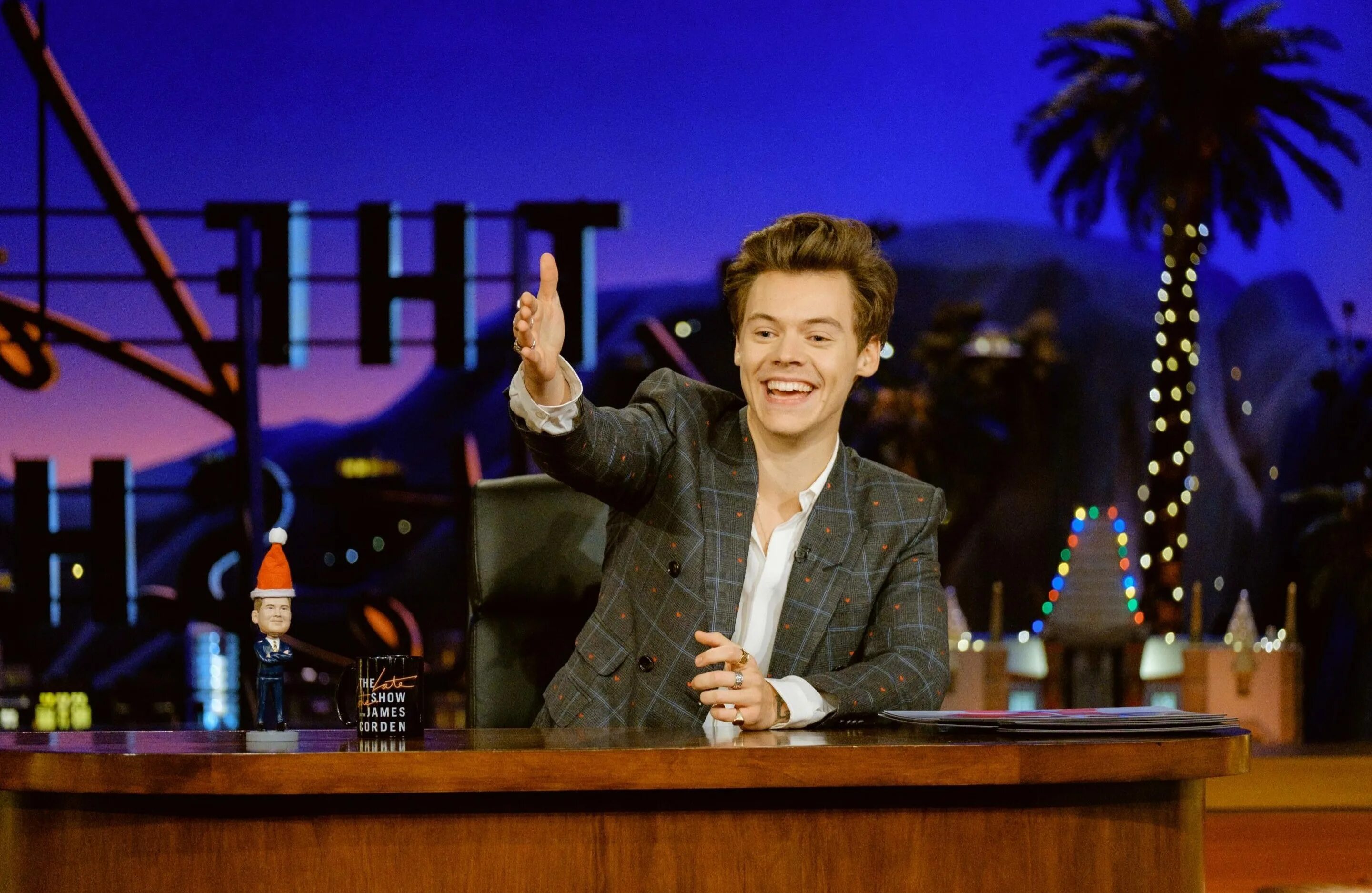 Harry Styles and James Corden. Harry Styles late late show. Shown james