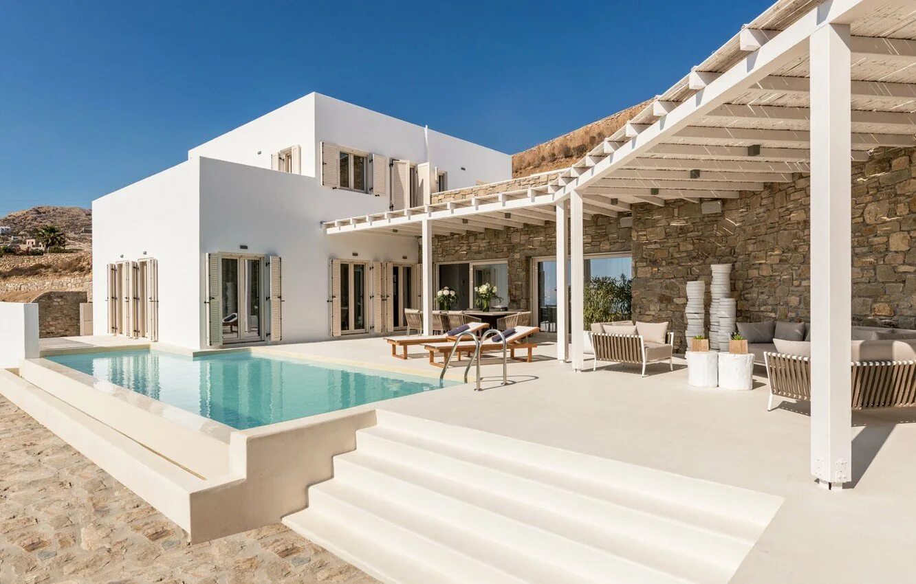 Санторини кикладский стиль в архитектуре. Платье в римском стиле. Порто хелли вилла. Средиземноморская архитектура греция. Домик в греческом стиле.