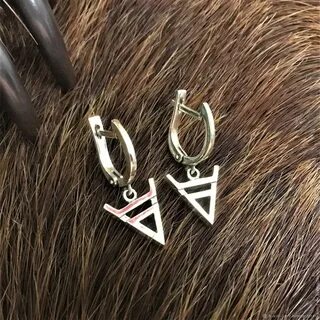 Сережки знаки