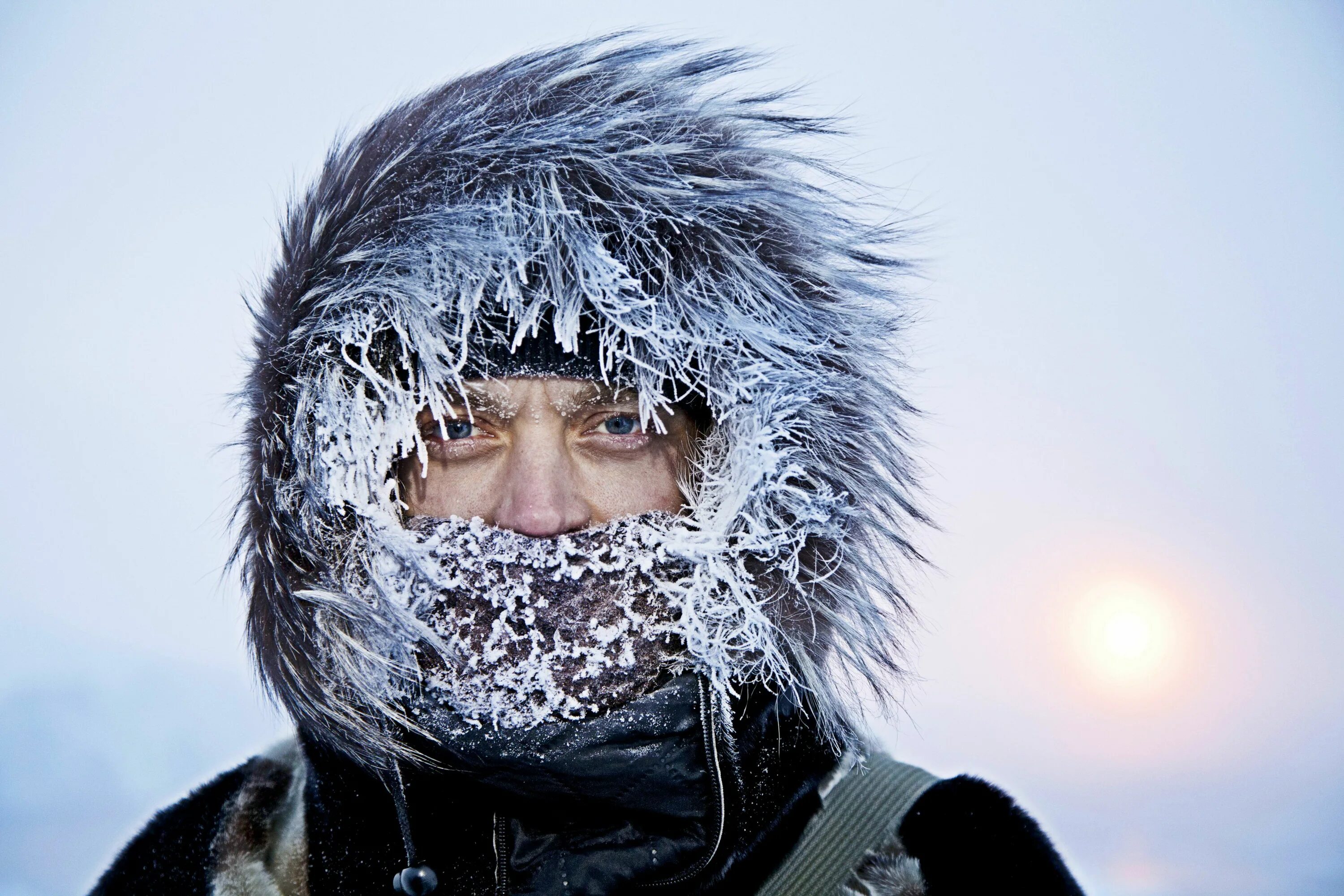 Russia winters are cold. Иней на лице. Люди зимой. Человек в снегу.