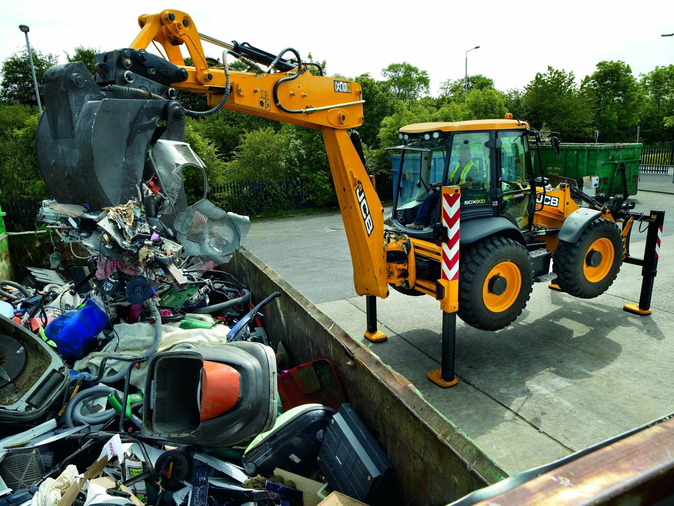 Турецкие экскаваторы. Экскаватор погрузчик JCB 2012. JCB 4cx. 4cx Wastemaster. Грейферный ковш на JCB.