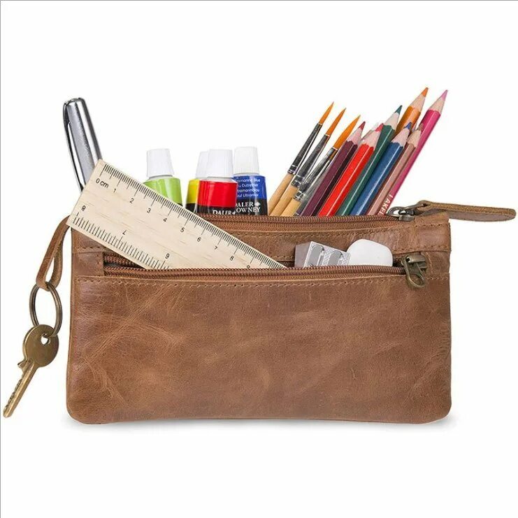 A pencil case in the desk. Сумка для карандашей. pencil case. pens in the pencil case. pencil case up view.
