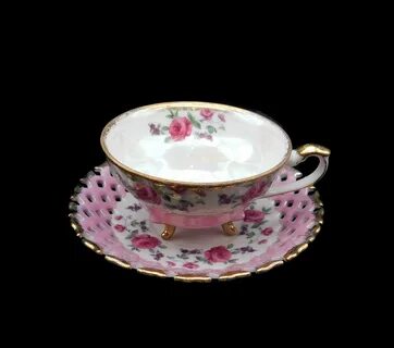 Vintage Napco China pink and white tea cup and saucer with hand-painted ros...
