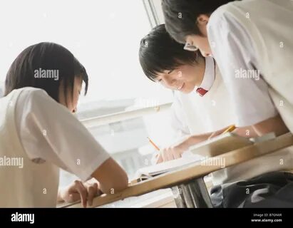 Students discuss the question paper after appearing in the 10th standard bo...