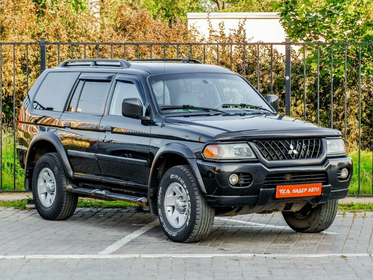 Mitsubishi Pajero Sport 1. Mitsubishi Pajero Sport 2008. Mitsubishi Pajero Sport 1 поколения. Митсубиси Паджеро спорт 2003.