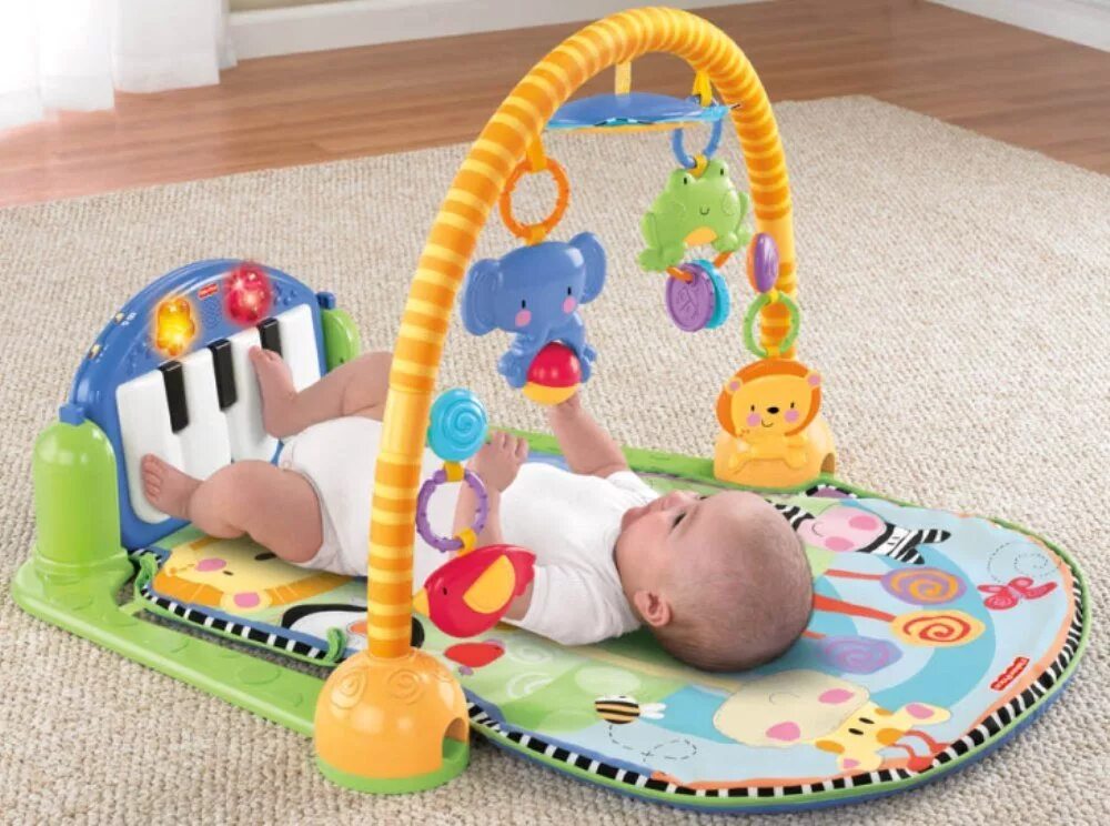 Купить игрушку 6 месяцев. Коврик Fisher Price пианино. Музыкальный коврик Fisher Price с пианино. Развивающий коврик для младенцев. Игрушки для новорожденных.