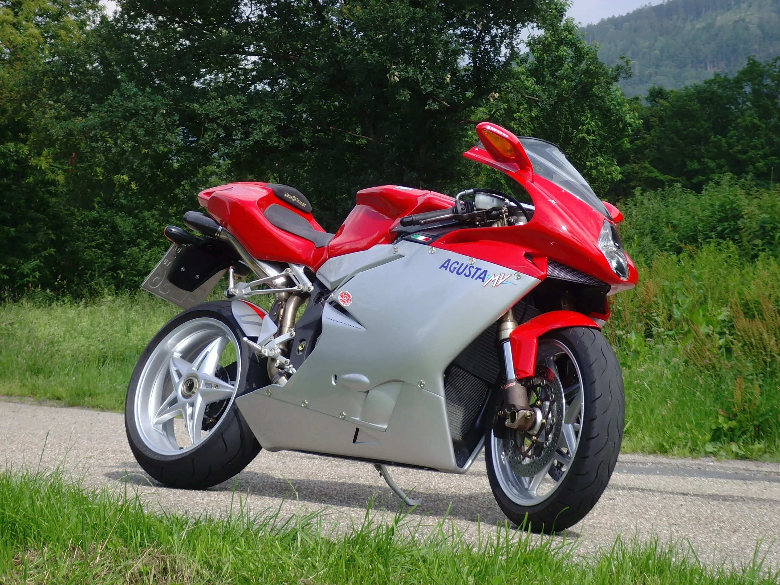 Купить мотоцикл 1000. MV Agusta f4 1000r. MV Agusta f4 1000 2006. MV Agusta f4 2014. MV Agusta f4 1000 Tamburini.