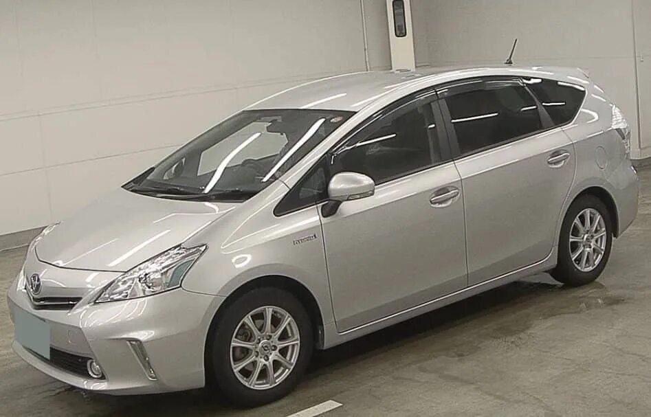 Тойота альфа гибрид. Toyota Prius Alpha 2014. Тойота Приус Альфа 2014. Тойота Приус Альфа черная 2014. Toyota Prius Альфа.