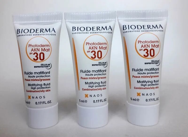 Спф 50 для лица от пигментных. Биодерма флюид спф 50. bioderma akn mat spf 50. биодерма солнцезащитный крем для лица spf 50. bioderma солнцезащитный крем 50 с тоном.