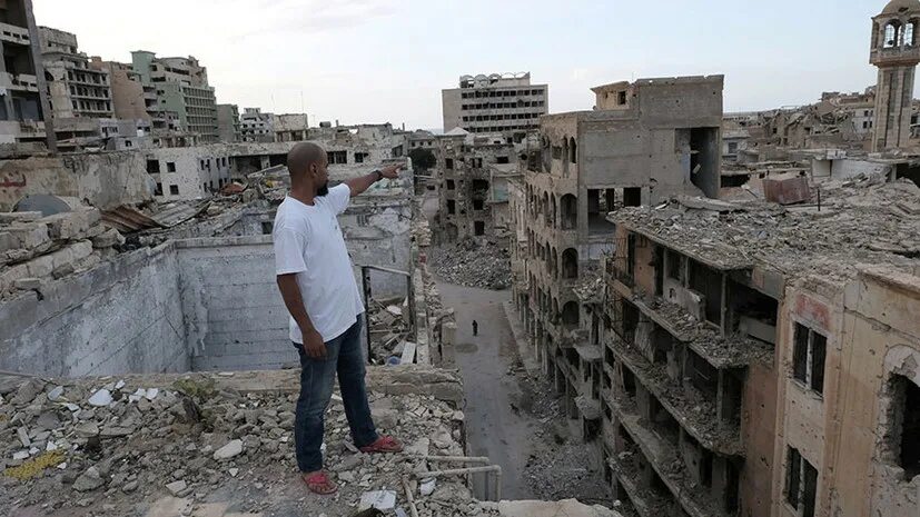 Car bomber kills two, wounds around 20 in Libya's Benghazi - medics By Reuters