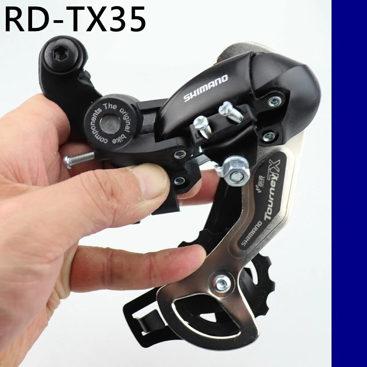 Shimano tourney велосипед. Shimano rd-tx35. переключатель shimano rd tx35. shimano tourney rd-tx35. задний переключатель shimano rd-tx35.