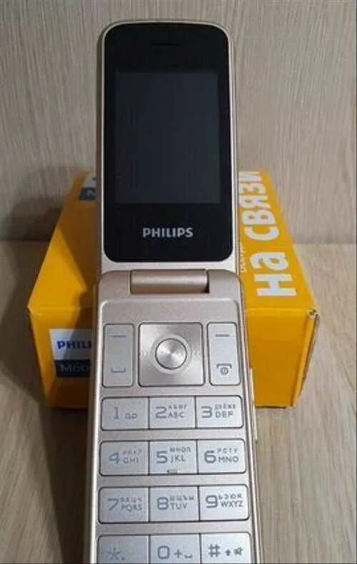 Кнопочная раскладушка филипс. Филипс е255. Филипс е255 раскладушка. Телефон Philips e255. Телефон Philips раскладушка e255.