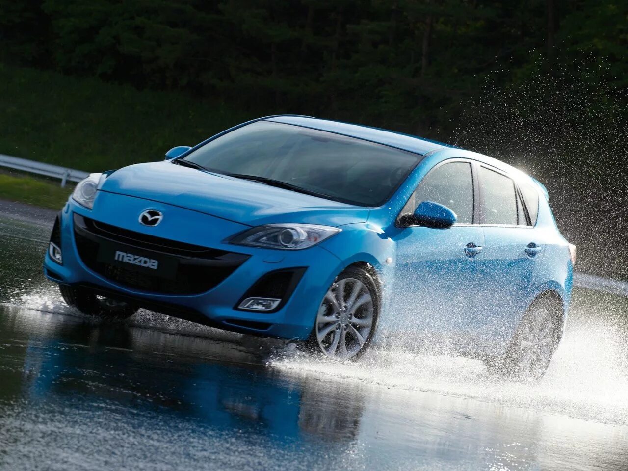 Машина мазда фото. Mazda 3 BL хэтчбек. Mazda 3 2010. Мазда 3 хэтчбек 2009. Mazda 3 2010 Hatchback.