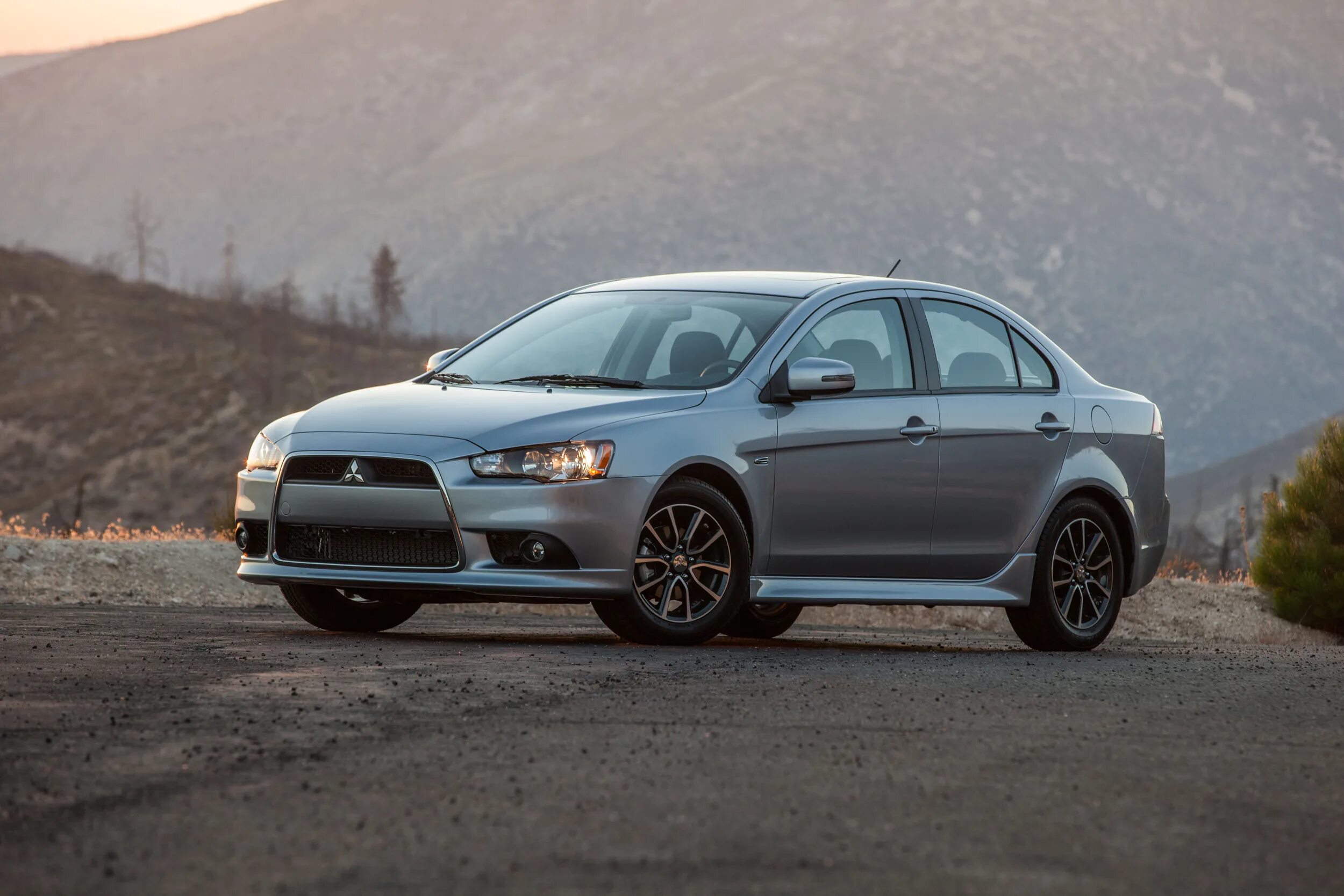 Mitsubishi lancer выпуска. Mitsubishi Lancer 2015. Митсубиси Лансер 2015. Митсубиси Лансер 10 2015. Mitsubishi Lancer 10 2015.