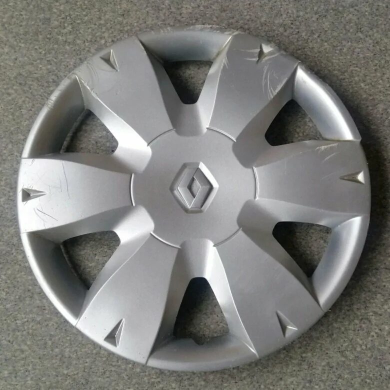 Колпаки рено логан r14. Колпак колеса renault logan r15. колпаки рено логан r15. колпак renault logan r15. колпак колеса рено логан r14 малый.