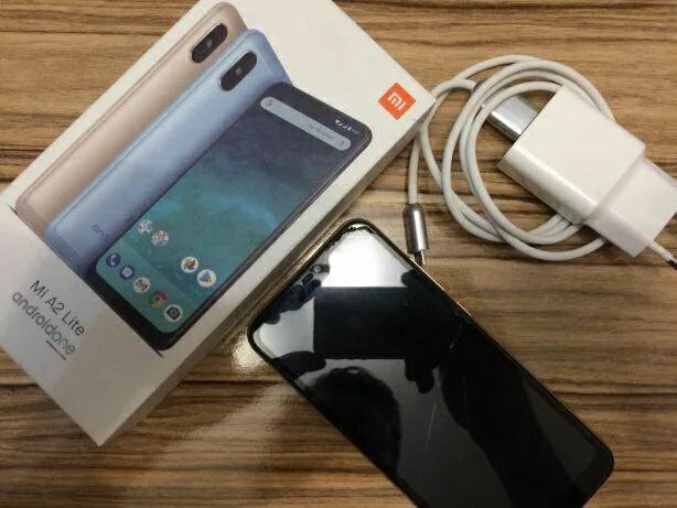 Mi a2 32 купить. Xiaomi mi a2 Lite XB[KB. Mi a2 Lite 3205 AKK. Mi a2 Lite narxi. Xiaomi mi a2 Lite коробка.