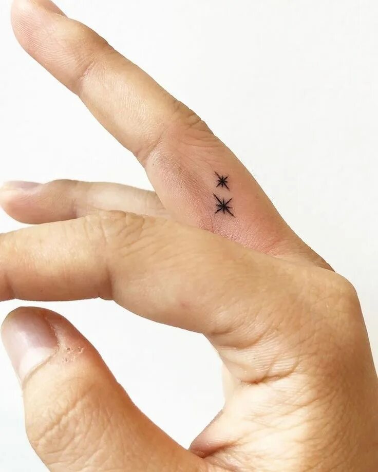 Small Magic Star Tattoo. Star Tattoos on finger. Small Stars. Very tiny Star Tattoo.