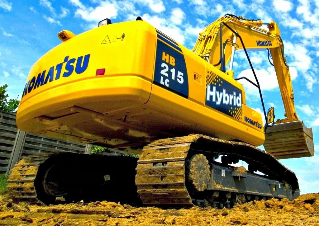 Строительная машина 5. Коматсу экскаватор гибрид. Komatsu 730. Komatsu Electric Excavator. Коматсу 730е.