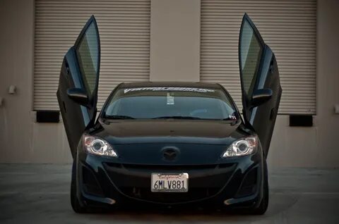 Двери mazda 3