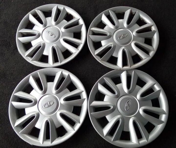 оригинальные колпаки гранта r14. колпаки на колёса r14 гранта. колпаки r14 lada granta оригинал. колпаки на колеса r14 лада гранта. колпаки на колеса r14 лада гранта.