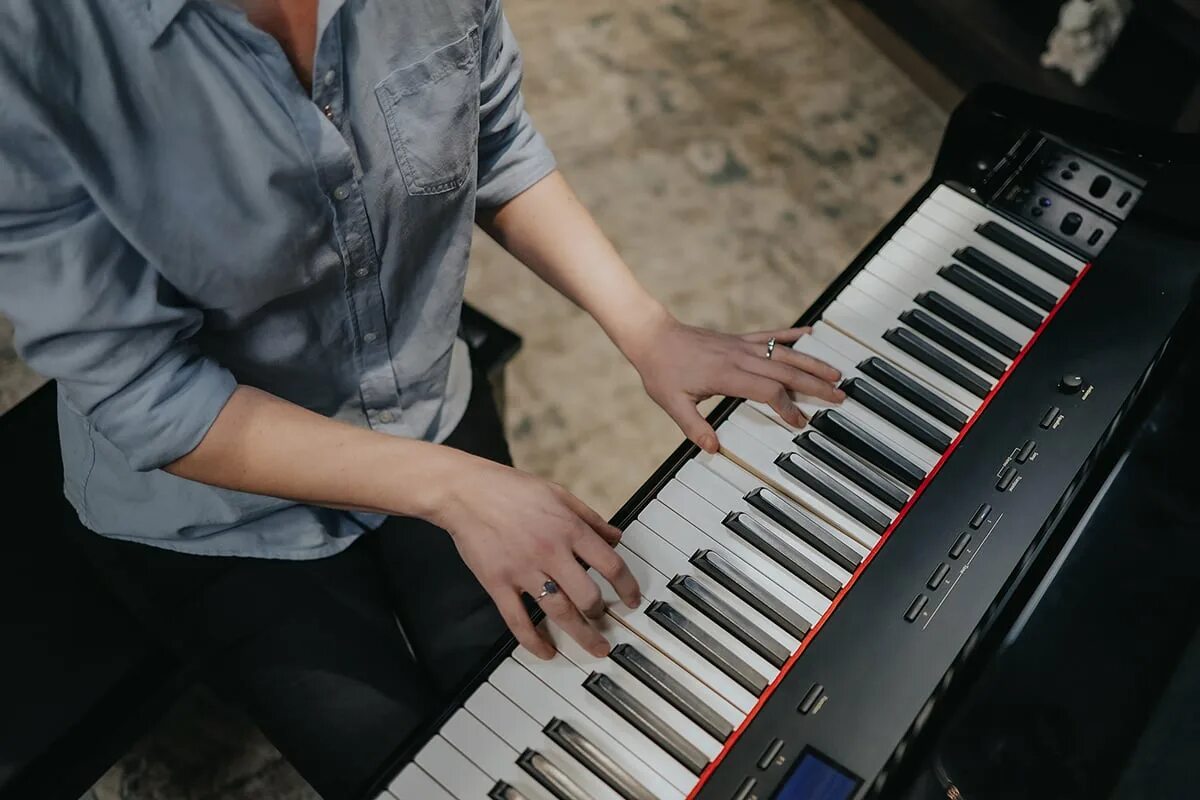 Play the Piano. Sister play piano